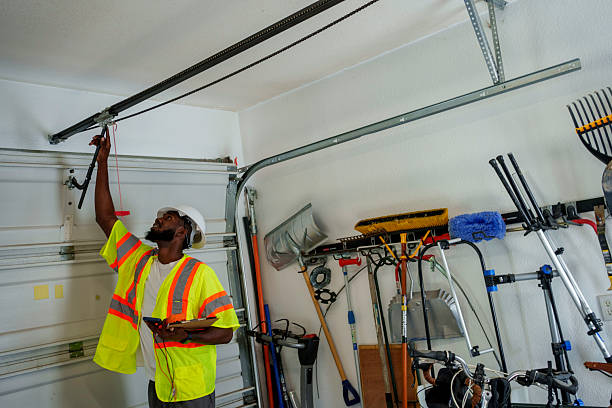 Professional Garage Door Panel Replacement technician working in Anadarko, OK